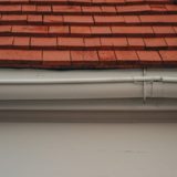 This is a sectional gutter. Notice how there are joints in the run that can cause leaks.